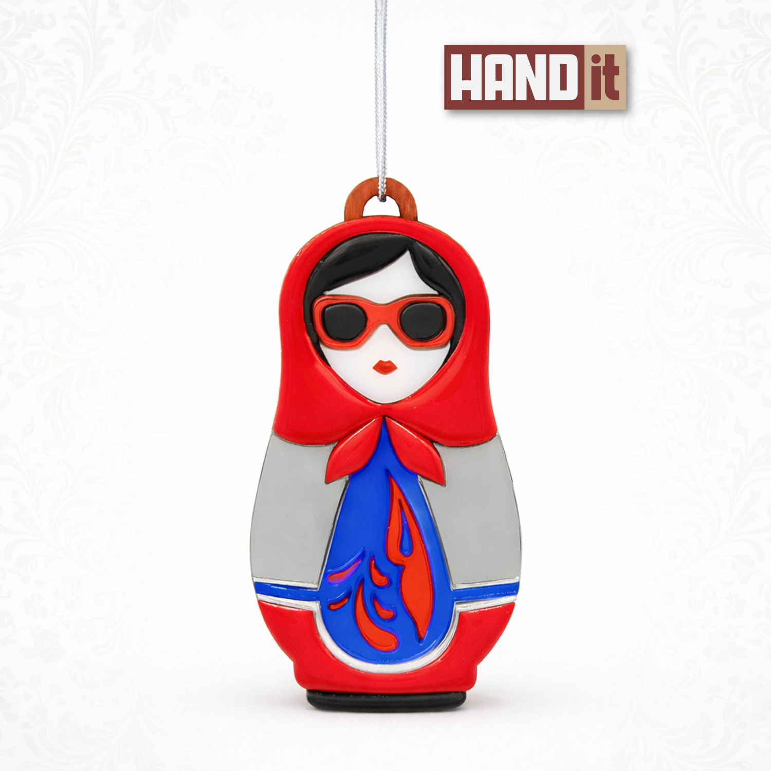 Ёлочная игрушка Матрёшка с узорами (красный с синим) Ёлочная игрушка Матрёшка с узорами (красный с синим)